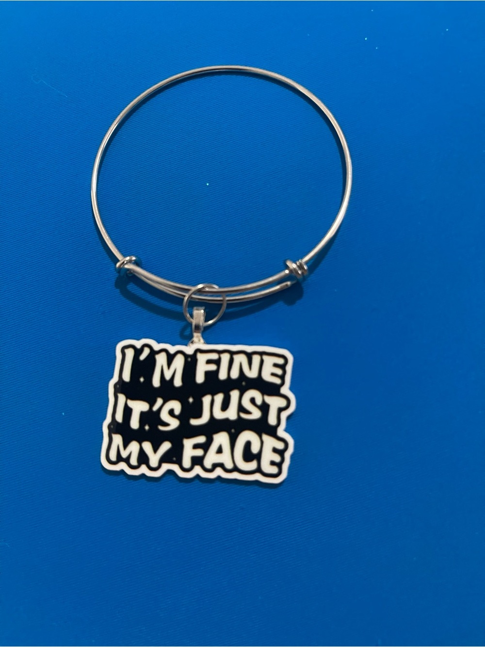 Silver Bangle Bracelet with Black 'I'm Fine It's Just My Face' Charm